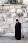 07 Orthodox Priest in front of Church